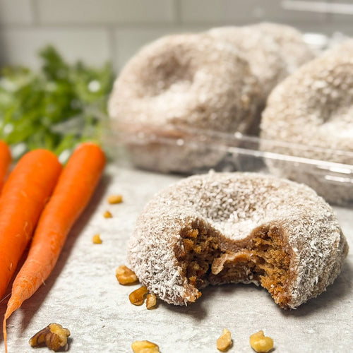 Gluten Free Carrot Cake donut with Maple Pecan Frosting and Coconut