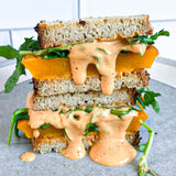 Gluten Free Sandwich with roasted squash, arugula and chipotle mayo