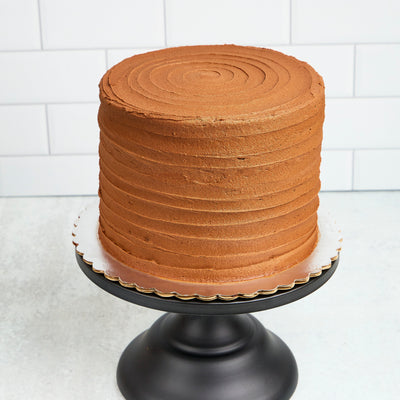 Rustic Chocolate Cake on a cake stand