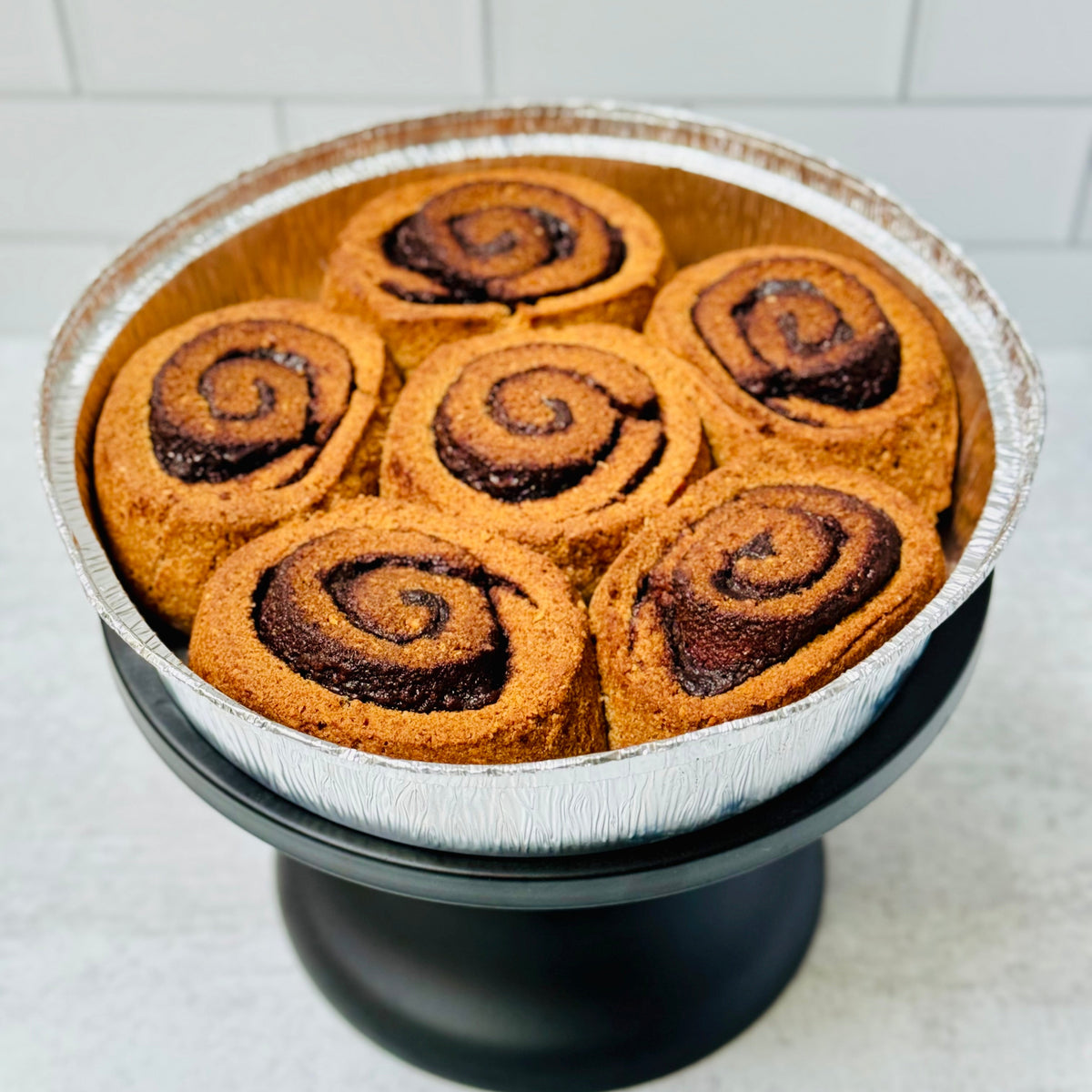Gluten Free Cinnamon Rolls inside an aluminum pan