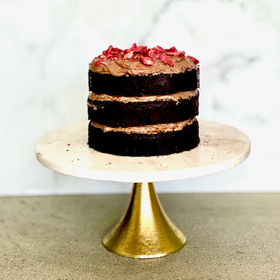 Rustic Chocolate Cake on a cake stand
